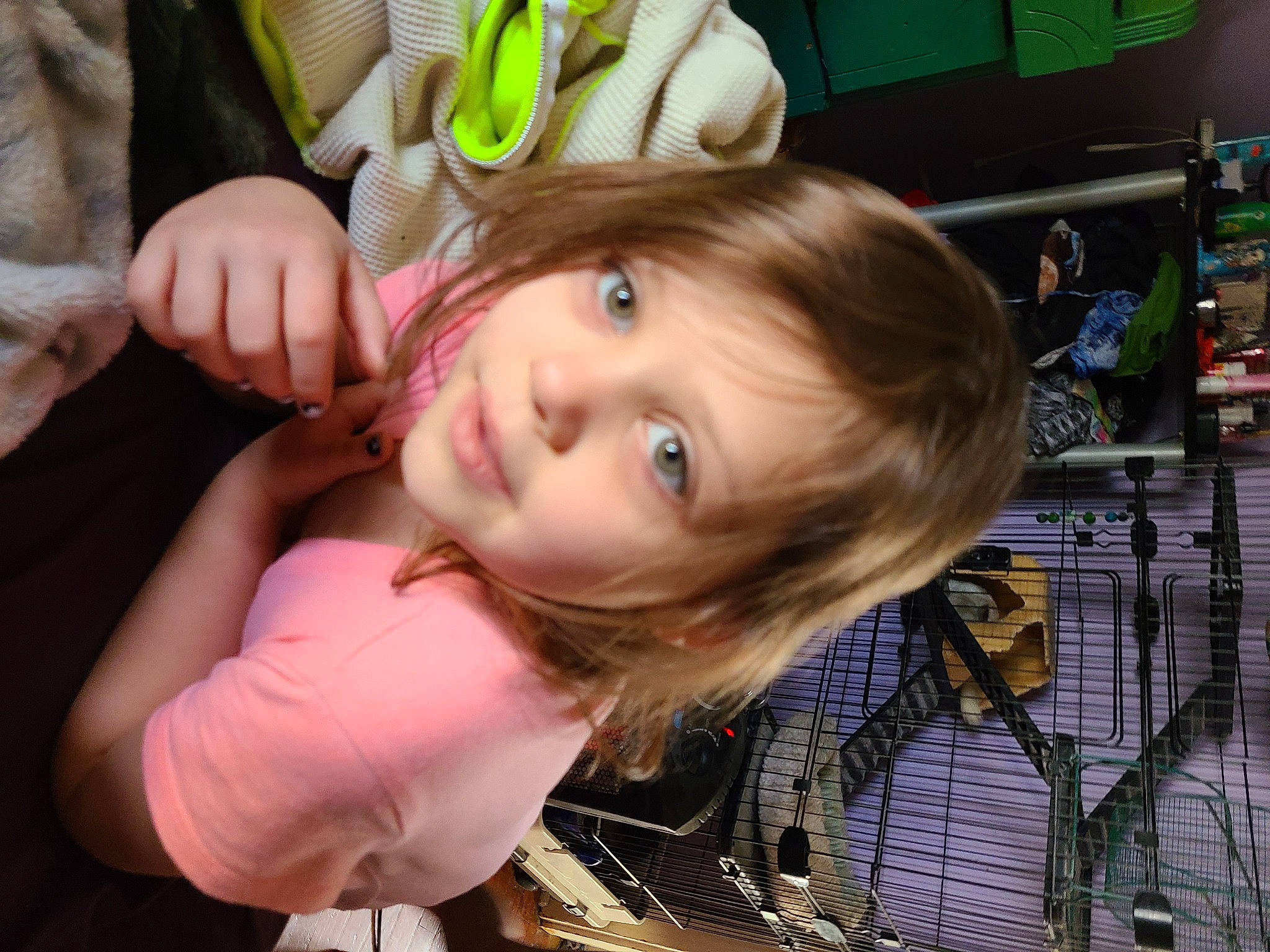 Dawn is registered to the contest to win money with this photo: bangs, cheek, child, ear, event, fashion_accessory, finger, fun, gesture, happy, leisure, mammal, mouth, nose, party_supply, person, room, skin, smile, toddler