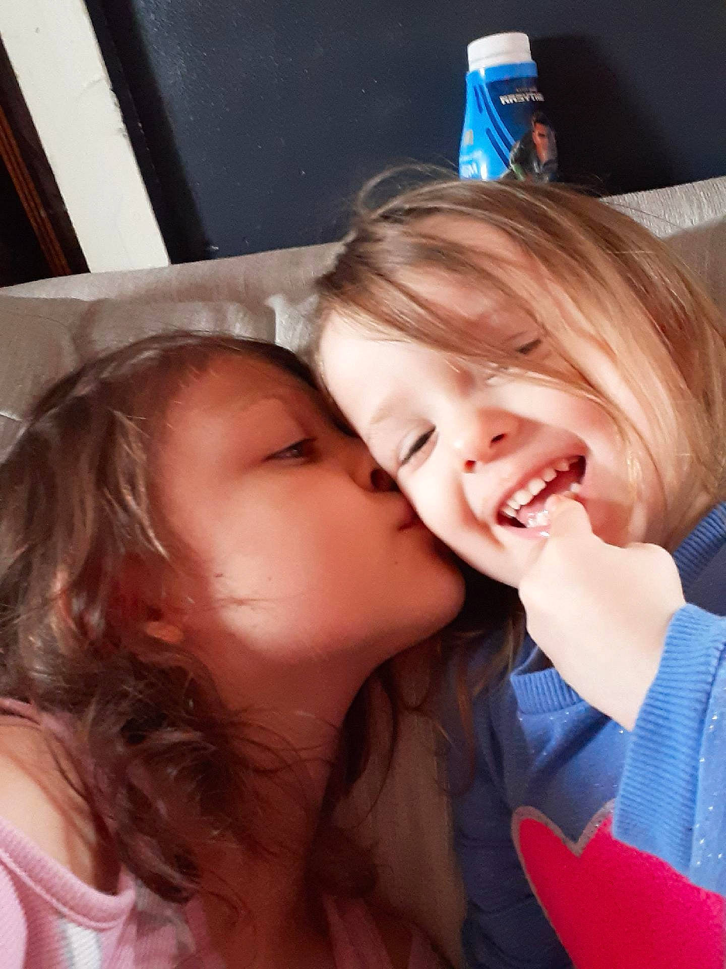 Dawn is registered to the contest to win money with this photo: cheek, cheek_kissing, ear, eyebrow, eyelash, facial_expression, finger, flash_photography, forehead, gesture, happy, human_body, iris, jaw, kiss, lip, mouth, nose, person, skin