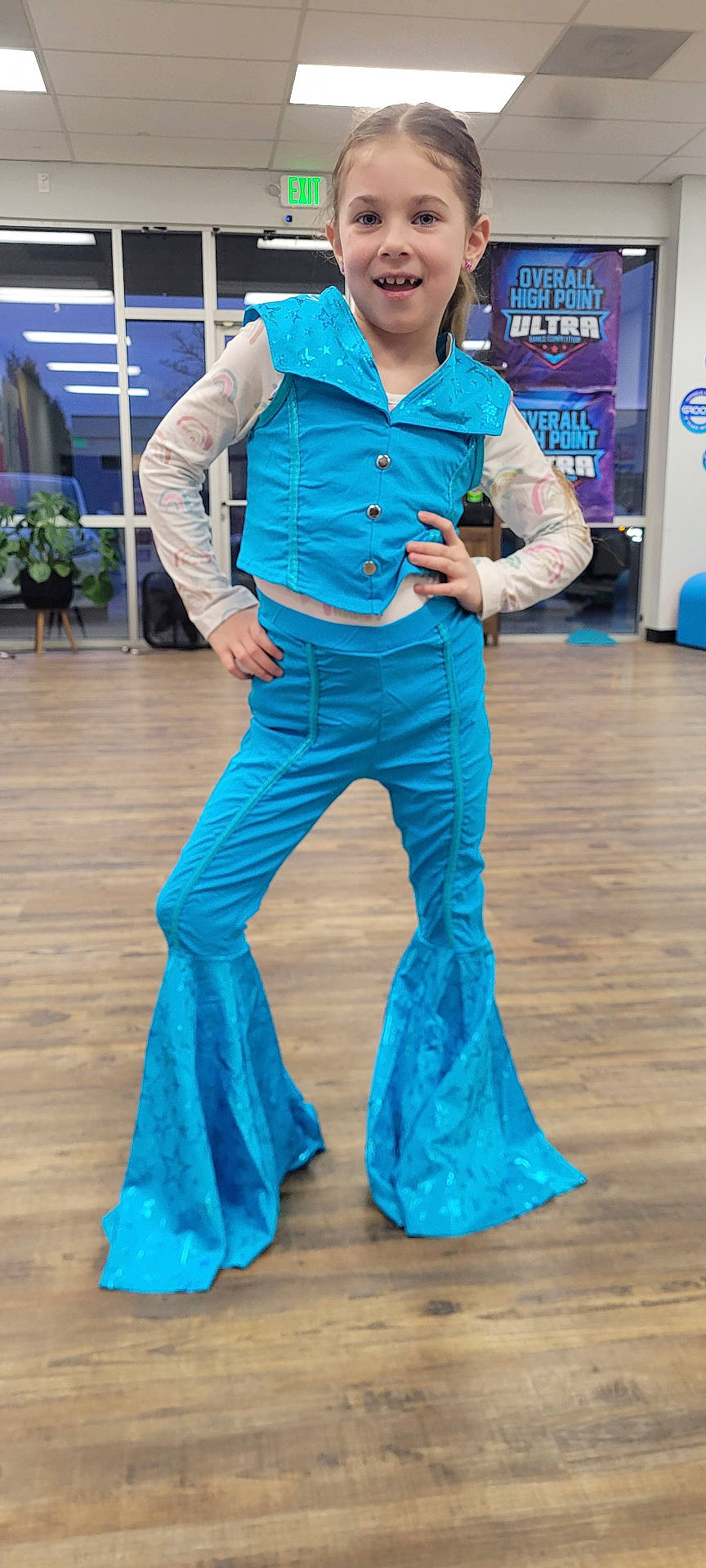 accessories, adult, bag, clothing, costume, dancing, dress, eveningdress, female, formalwear, handbag, hardwood, jeans, leisureactivities, longsleeve, pants, person, sleeve, woman, wood