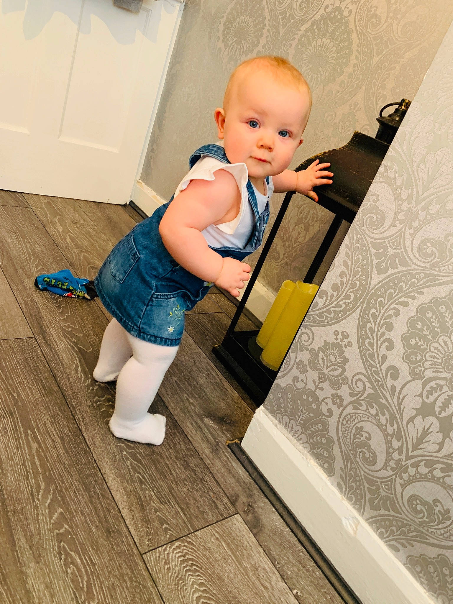 Amelia-grace is registered to the contest to win money with this photo: baby, child, floor, flooring, joint, leg, person, product, sitting, skin, standing, toddler, wood, wood_flooring