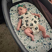 Astrid joined the competition — help win amazing prizes! baby, bed, blanket, clothing, cradle, crib, cushion, dress, face, furniture, head, homedecor, infantbed, newborn, person, photography, portrait