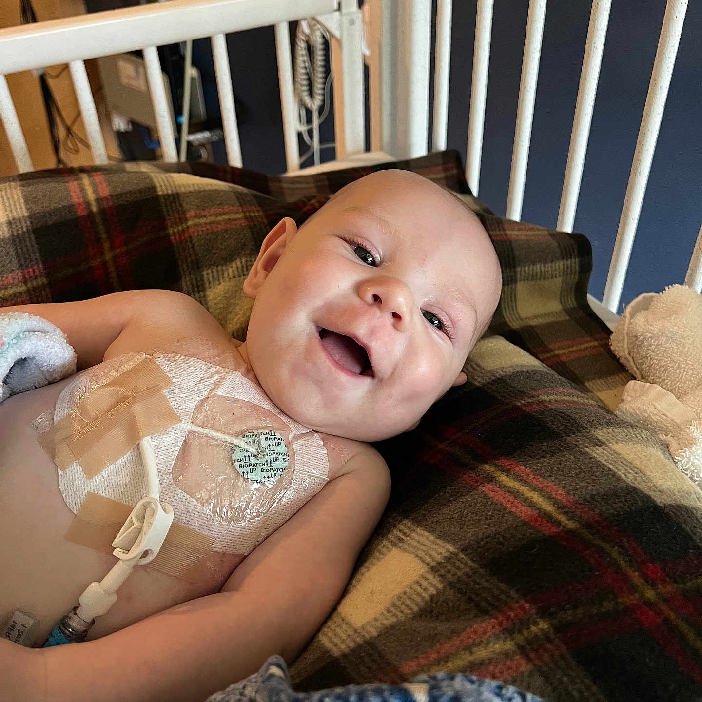 Wyatt is registered to the contest to win money with this photo: baby, babylaughing, crib, crying, cushion, face, furniture, happy, head, homedecor, infantbed, laughing, person, photography, portrait, sad, smile