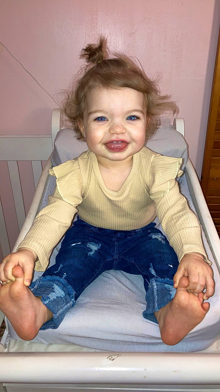 Charlie is registered to the contest to win money with this photo: baby_toddler_clothing, cheek, chin, comfort, dress, finger, hair, hairstyle, hand, happy, iris, joint, leg, lip, mouth, nose, person, skin, sleeve, smile