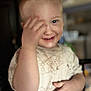 Tatum joined the competition — help win amazing prizes! child, toddler, smiling, hand, face, shirt, cartoon_print, indoor, blurry_background, happy, cute, young_child, person, skin, short_hair, playful, portrait, casual_clothing, human, baby