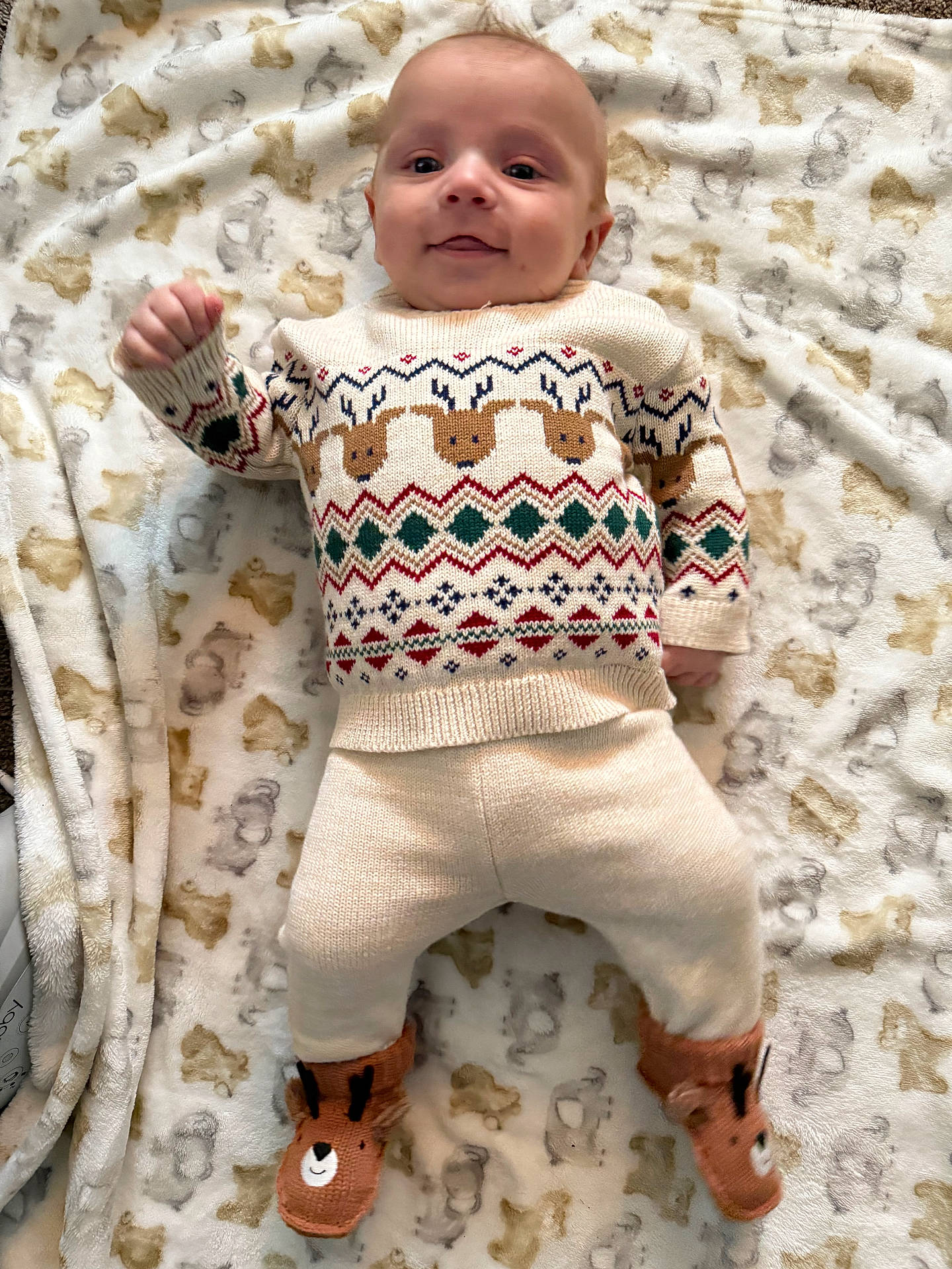 Elijah joined the competition — help win amazing prizes! baby, blanket, bodypart, clothing, face, finger, footwear, furniture, hand, head, homedecor, knitwear, newborn, pants, person, photography, portrait, quilt, shoe, sweater