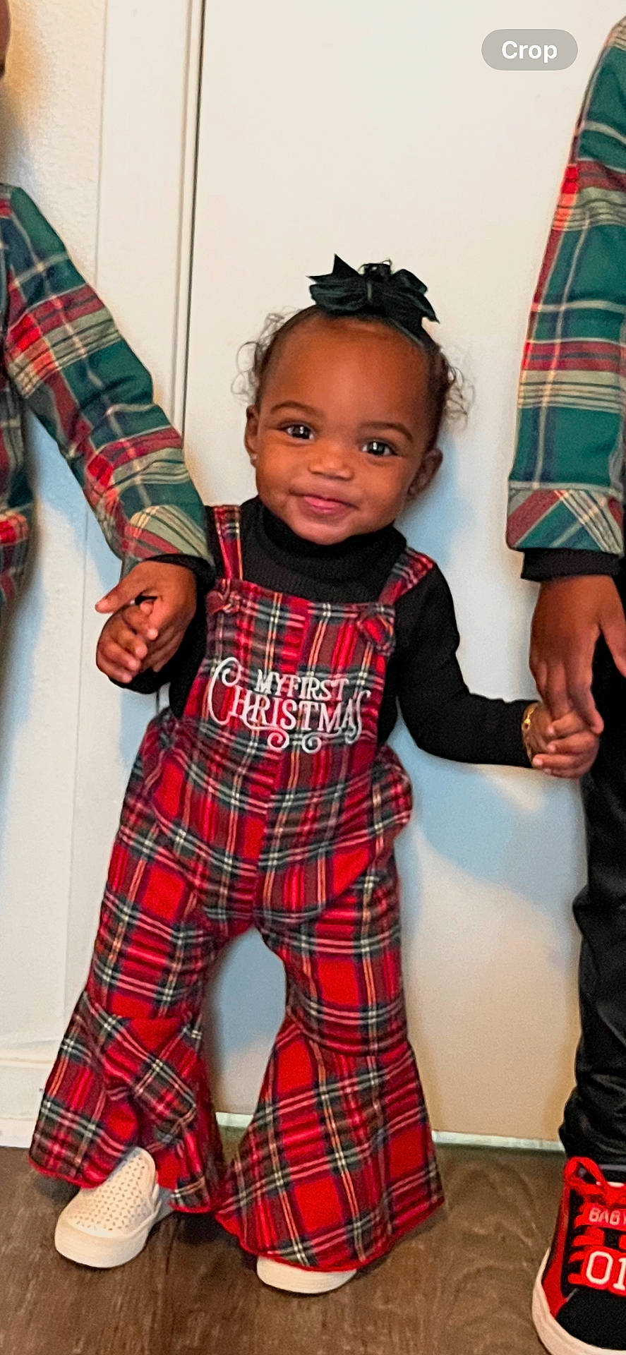 adult, baby, bodypart, clothing, face, finger, footwear, hand, head, male, man, pants, person, photography, portrait, shirt, shoe, skirt, sneaker, tartan