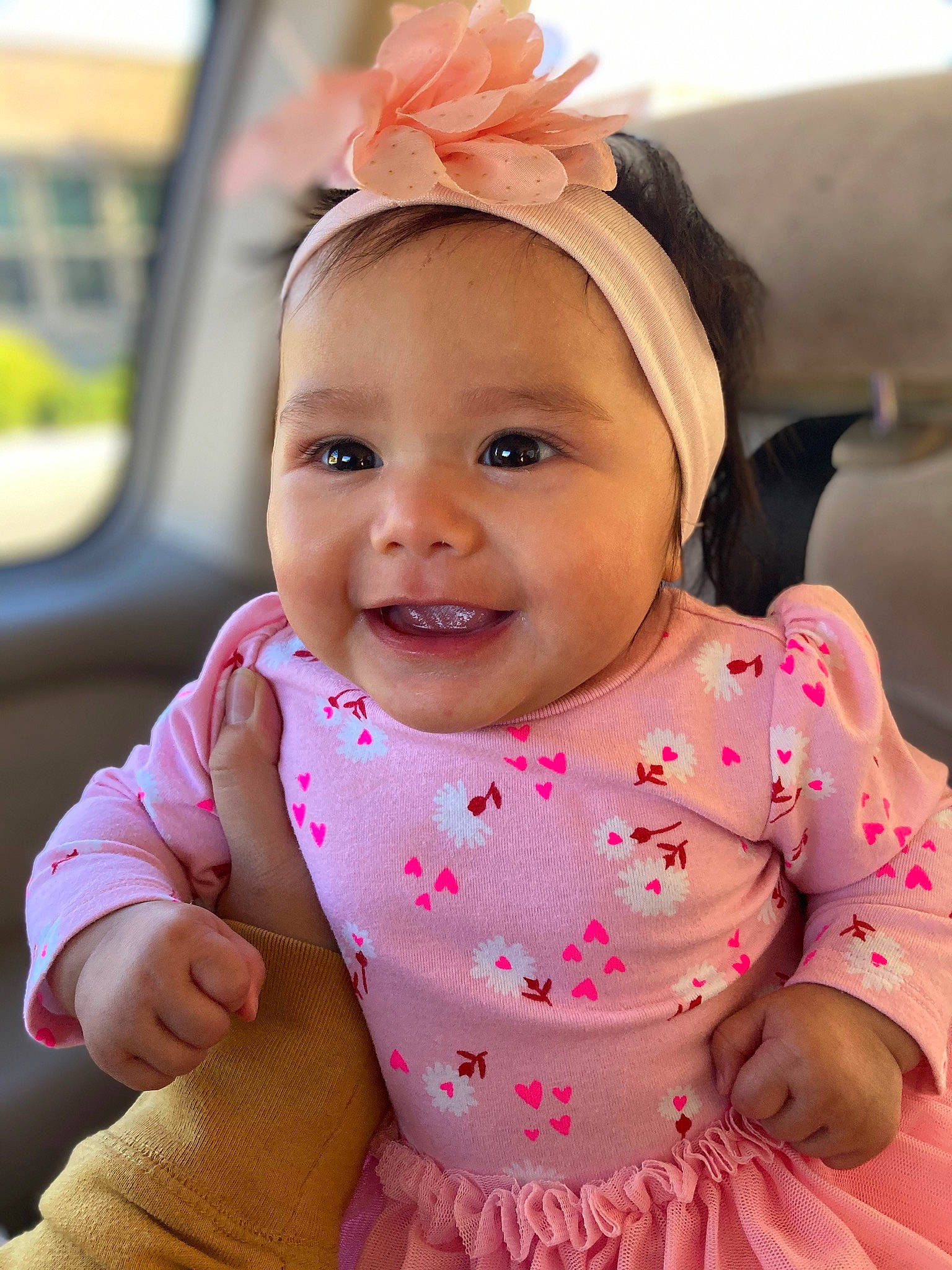 Ellie Kauhi is registered to the contest to win money with this photo: baby, baby_toddler_clothing, cheek, chin, dress, eyelash, face, fun, happy, headband, headgear, headwear, iris, joy, lip, magenta, neck, person, pink, skin