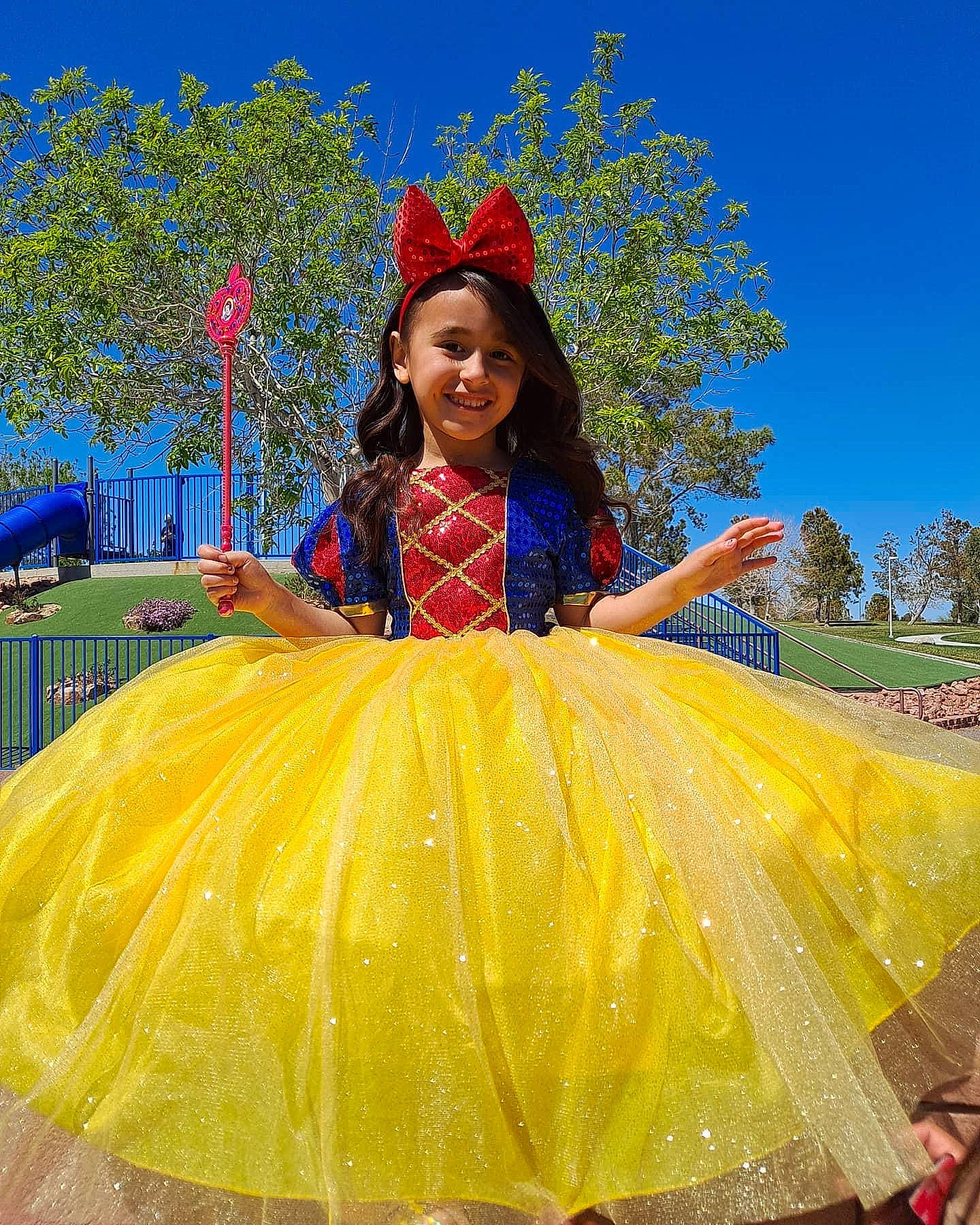 Elaina Kauhi joined the competition — help win amazing prizes! costume, dress, electric_blue, event, fashion_design, formal_wear, fun, happy, hat, headpiece, joy, leisure, magenta, people_in_nature, person, photograph, recreation, ruffle, sky, smile