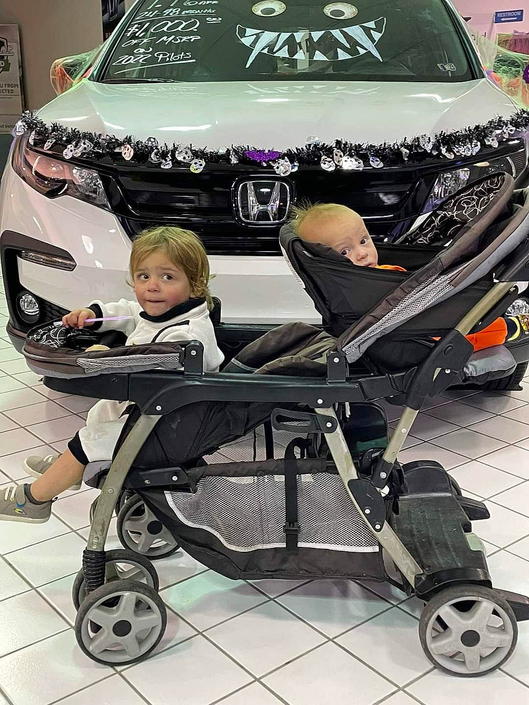 Kash joined the competition — help win amazing prizes! automotive_design, automotive_exterior, automotive_lighting, automotive_tire, black, bumper, car, hood, land_vehicle, light, mode_of_transport, motor_vehicle, person, personal_luxury_car, product, rim, tire, vehicle, vehicle_door, wheel