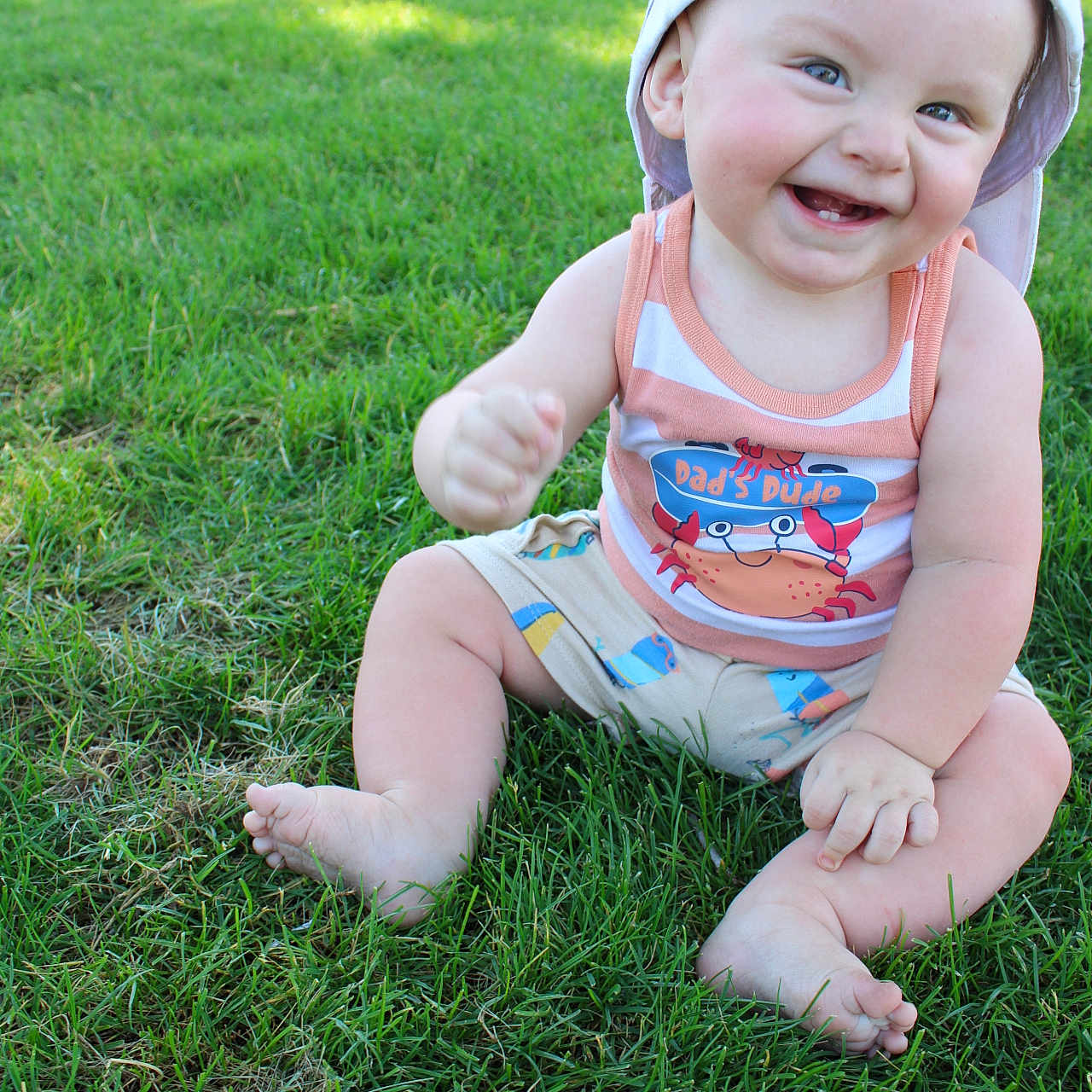 Dayton joined the competition — help win amazing prizes! baby, baseballcap, cap, car, clothing, face, grass, happy, hat, head, lawn, nature, outdoors, person, photography, plant, portrait, transportation, vehicle, yard