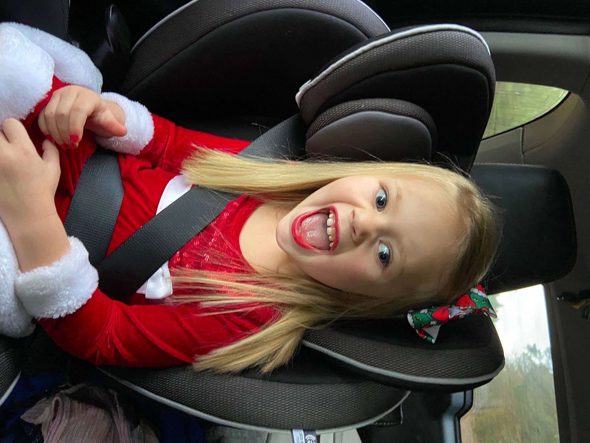 Avaclaire is registered to the contest to win money with this photo: car_seat, car_seat_cover, costume_accessory, family_car, glove, head_restraint, person, plush, stuffed_toy, toy, vehicle_door