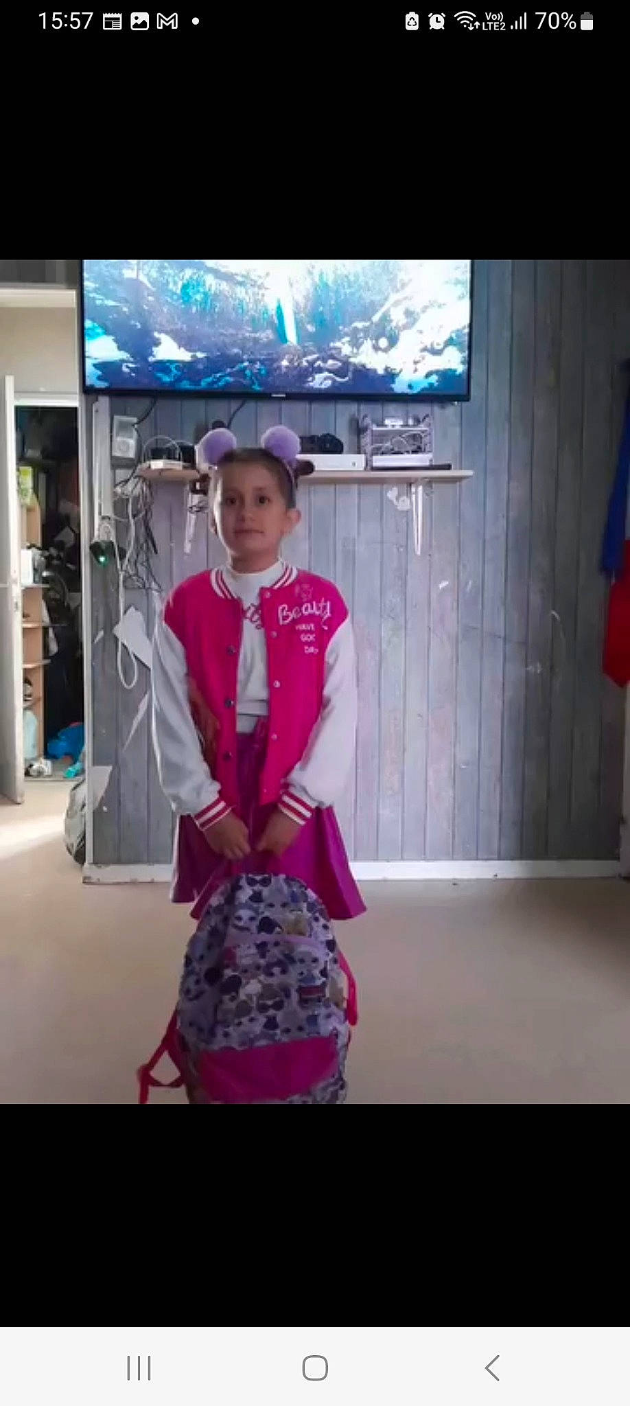 Louisa participe au concours pour gagner de l'argent avec cette photo : bag, child, costume, display_device, electric_blue, event, fashion_design, formal_wear, fun, hat, led_backlit_lcd_display, magenta, person, pink, purple, room, sleeve, television, uniform, vintage_clothing