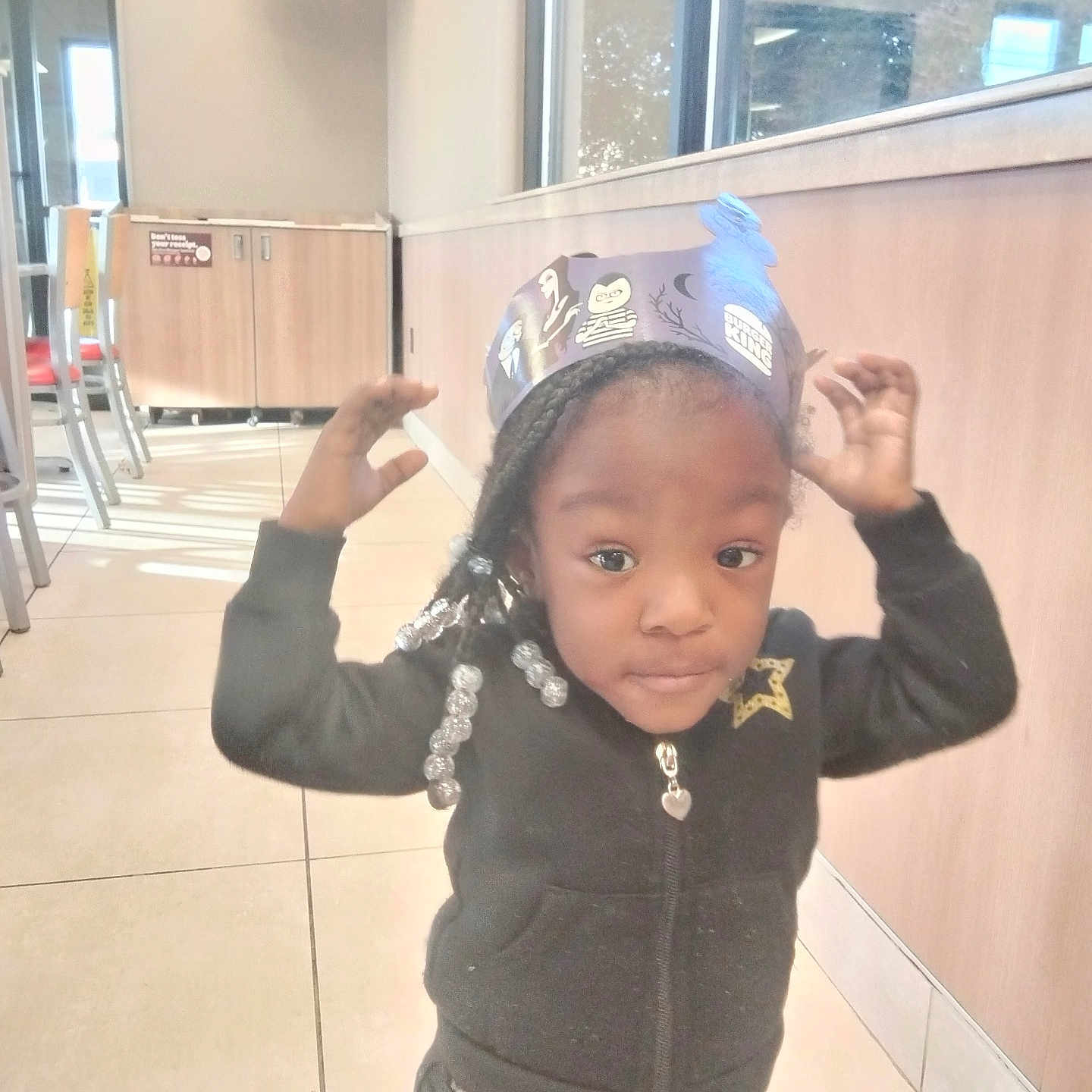 C'Honesty is registered to the contest to win money with this photo: baseballcap, bodypart, cap, child, clothing, coat, door, face, female, finger, girl, hand, hat, head, jacket, pants, person, photography, portrait, wood