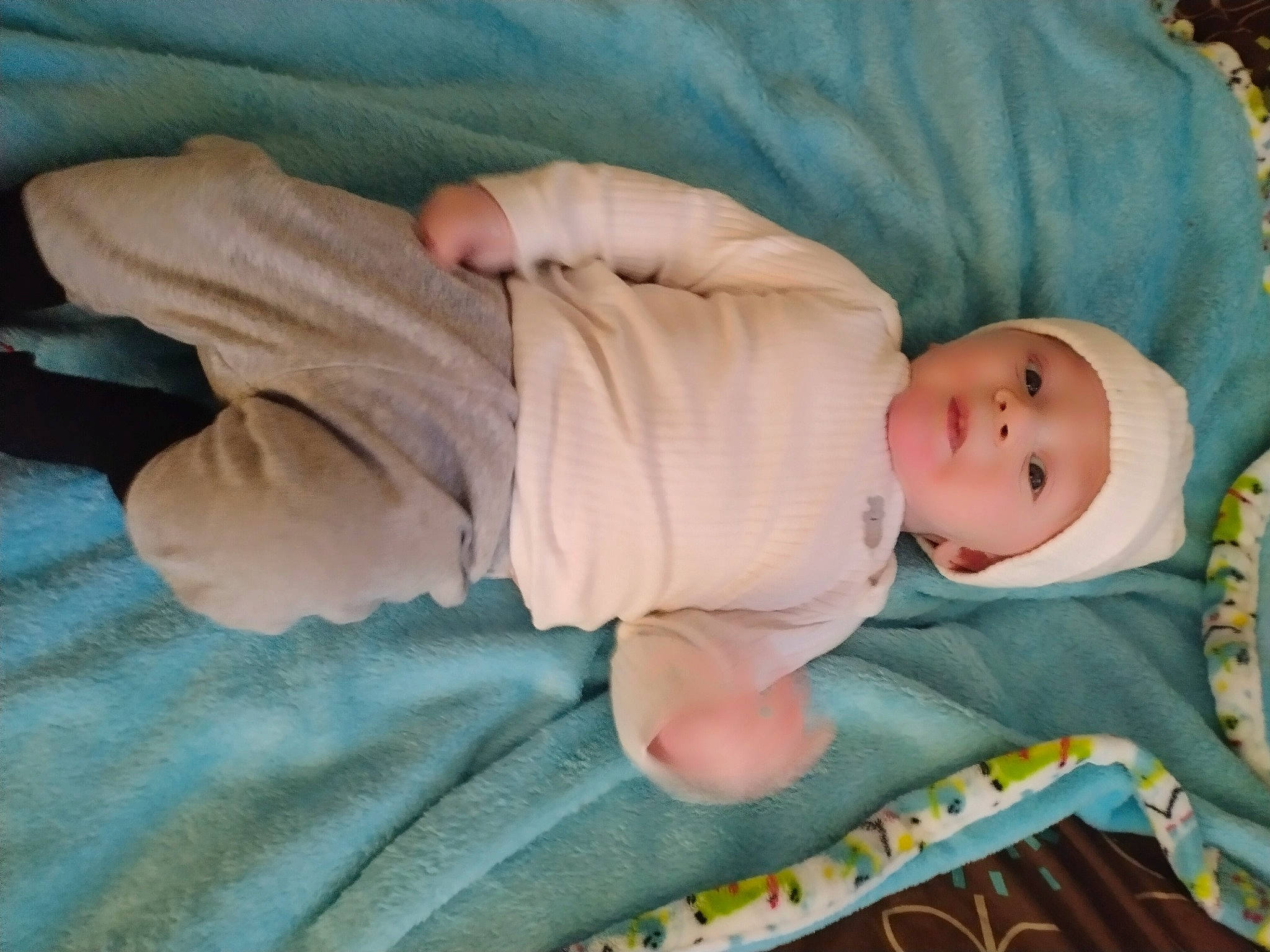 Chance is registered to the contest to win money with this photo: baby, baby_products, baby_sleeping, baby_toddler_clothing, bedtime, child, comfort, gesture, grass, headwear, linens, nap, person, room, sitting, skin, sleep, sleeve, textile, thumb