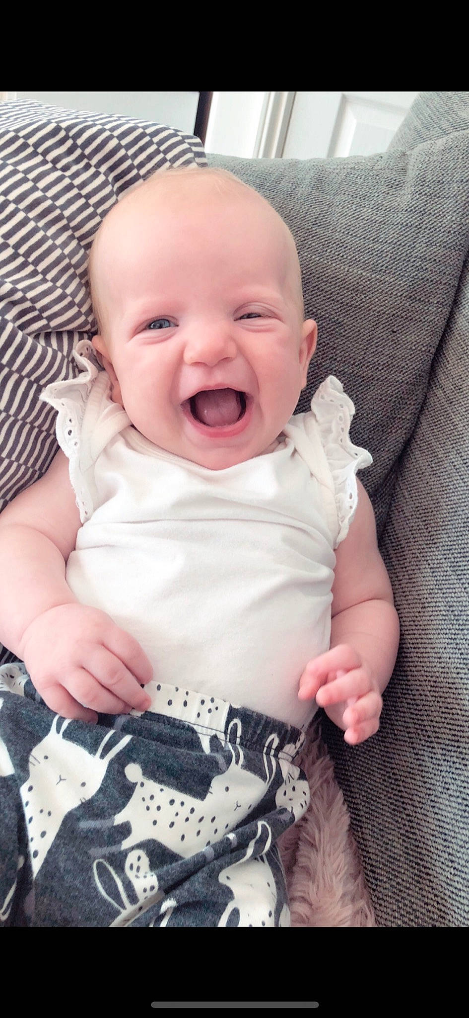 Eadie joined the competition — help win amazing prizes! baby, baby_laughing, baby_making_funny_faces, baby_products, baby_toddler_clothing, cheek, child, face, facial_expression, happy, head, laugh, lip, mouth, nose, person, product, skin, smile, toddler