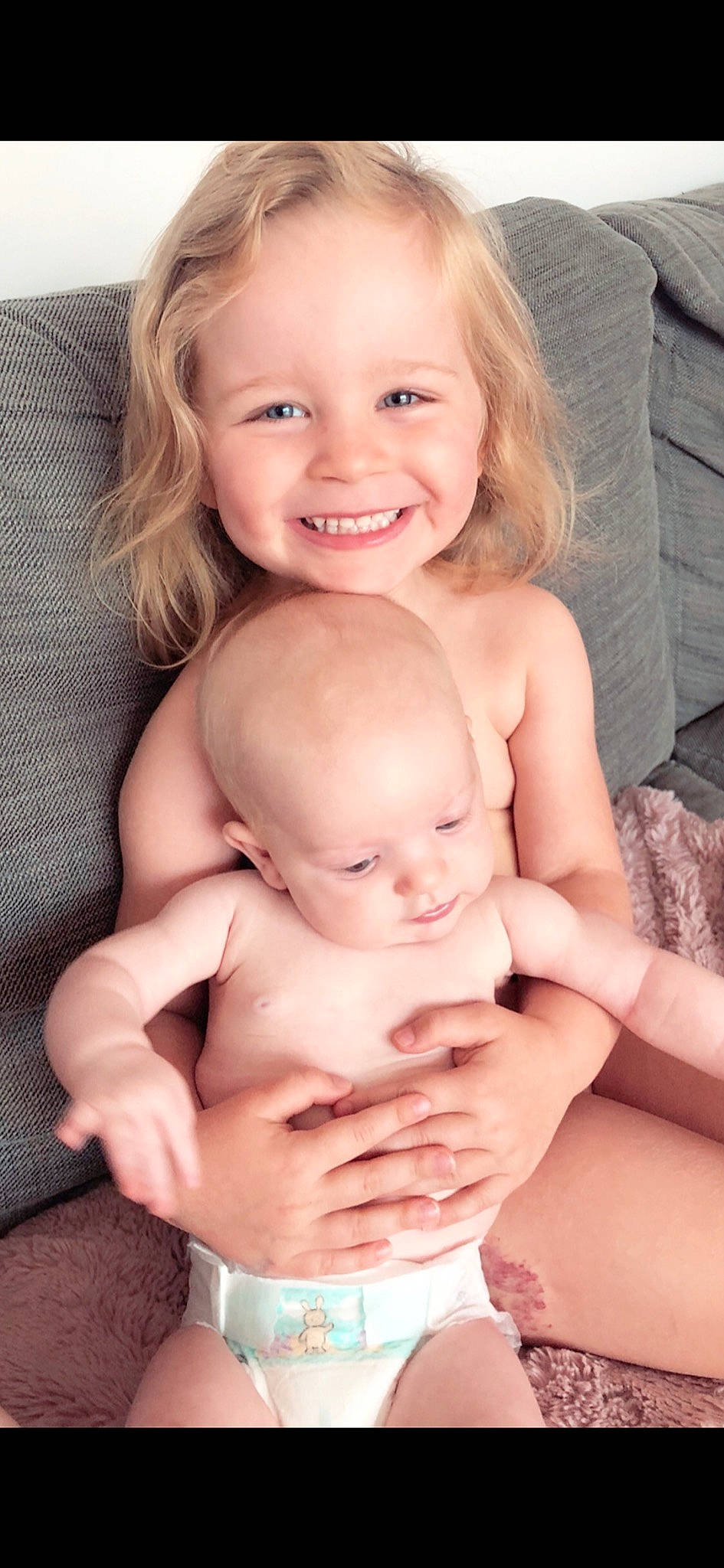 Amelie joined the competition — help win amazing prizes! baby, blond, cheek, child, face, facial_expression, joy, person, skin, smile, stomach, toddler