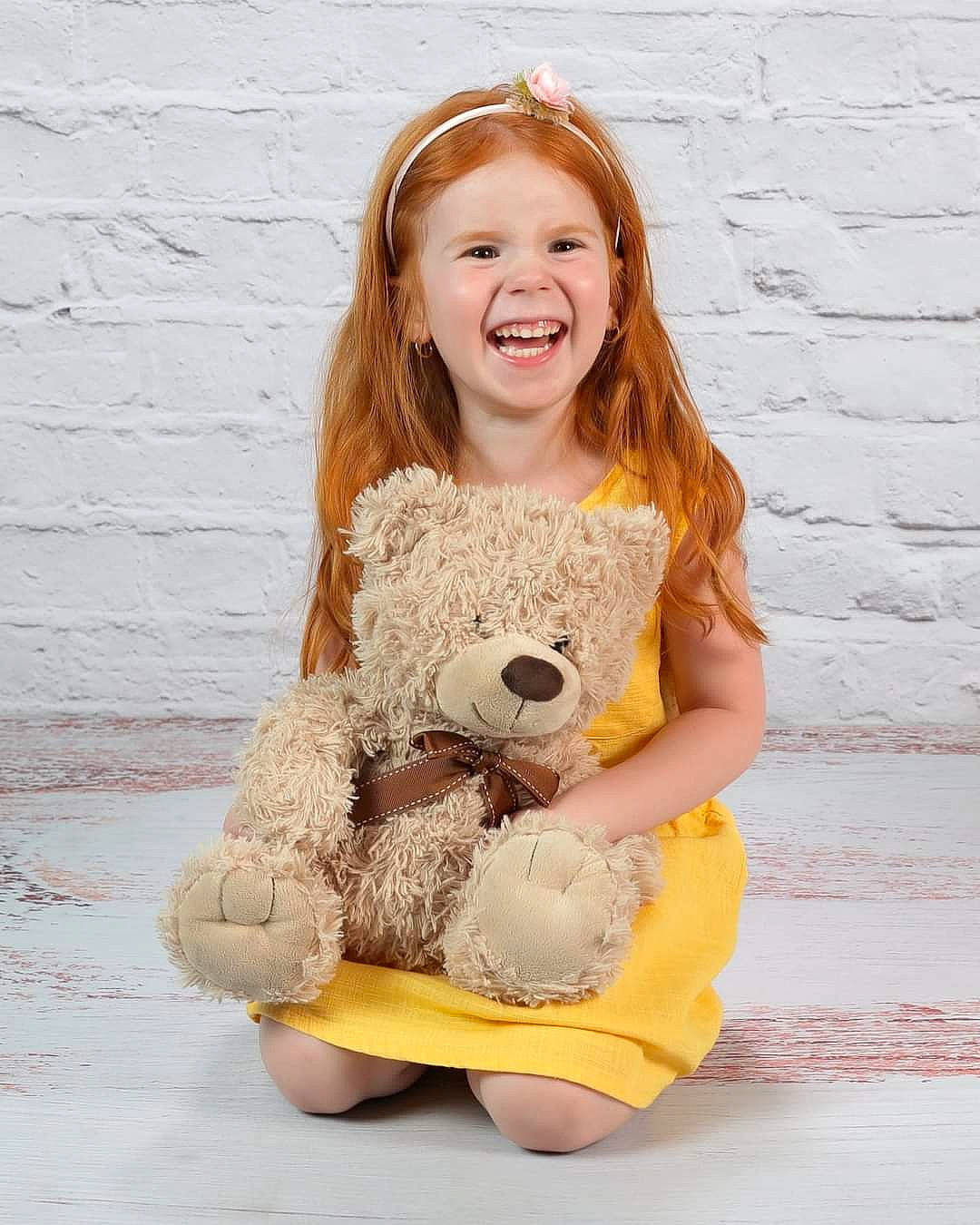 Theia joined the competition — help win amazing prizes! baby_toddler_clothing, beauty, brown_hair, doll, dress, fashion_accessory, fawn, fur, happy, head, human_body, joy, pattern, person, pink, plush, sleeve, smile, stuffed_toy, teddy_bear