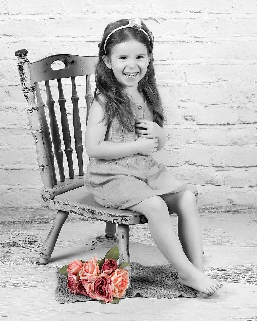 Theia is registered to the contest to win money with this photo: beauty, black, black_and_white, chair, flash_photography, hairstyle, happy, human_leg, joy, knee, leg, long_hair, monochrome, monochrome_photography, people, person, photograph, smile, style, thigh