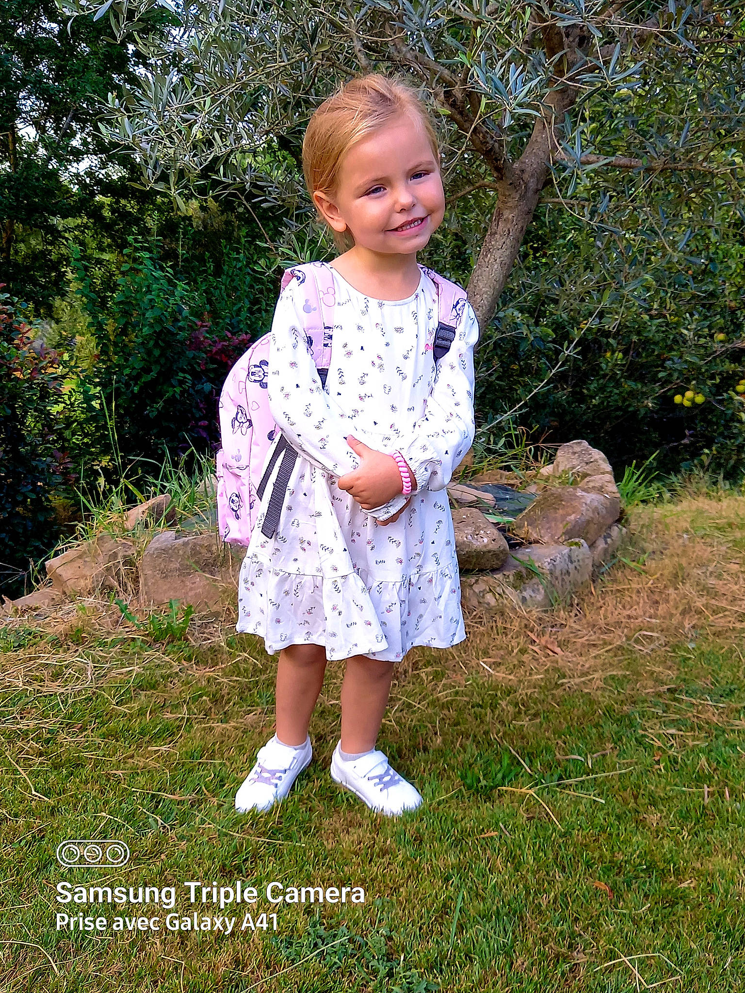 Lena a rejoint le concours — aidez-le/la à gagner de superbes lots ! baby_toddler_clothing, beauty, child, day_dress, dress, face, grass, grassland, happy, joy, mammal, one_piece_garment, pattern, people_in_nature, person, pink, plant, sleeve, smile, street_fashion