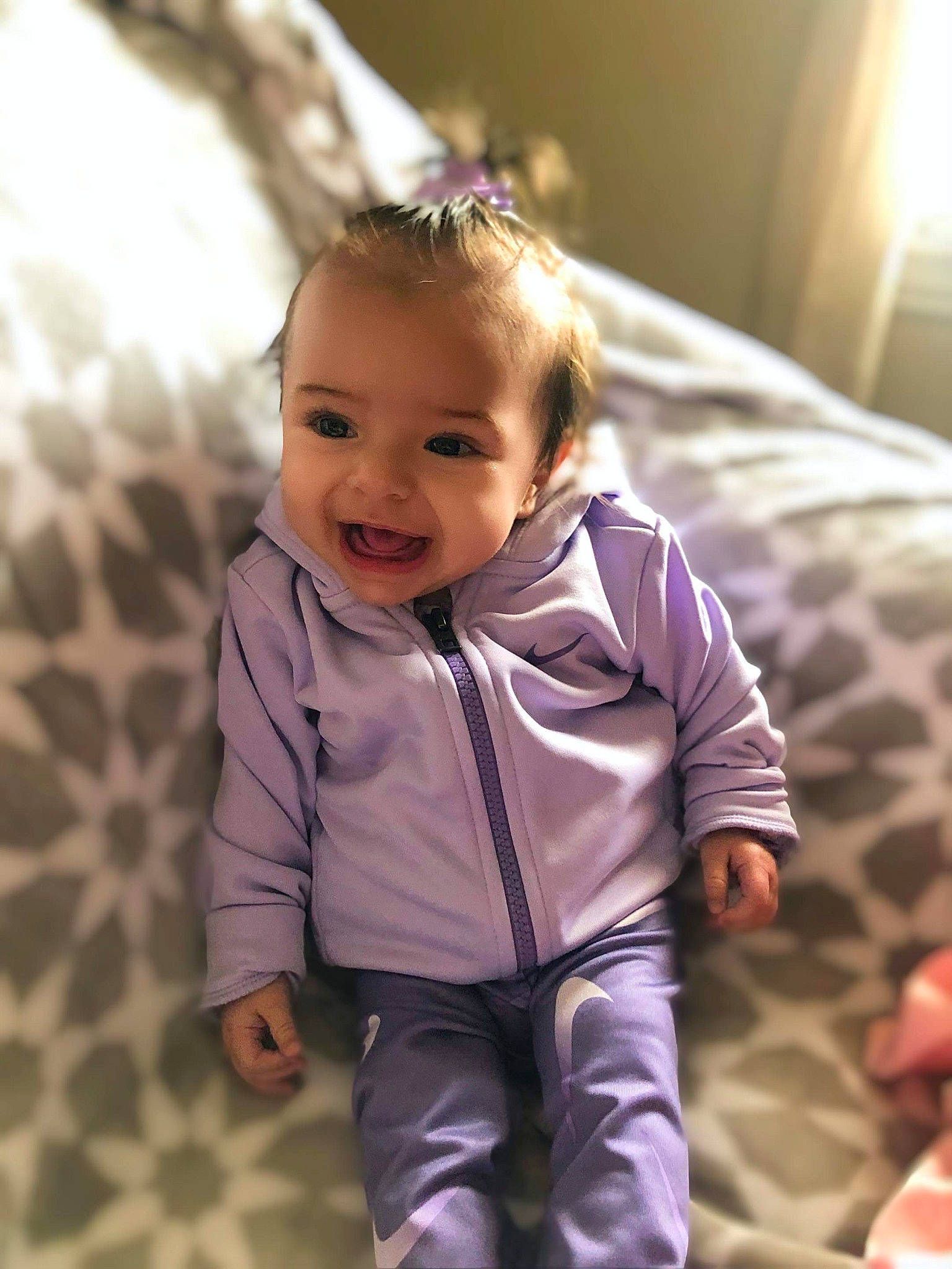 Aubrie is registered to the contest to win money with this photo: baby, cheek, child, eye, face, facial_expression, family, happy, head, human, outerwear, people, person, skin, smile, toddler, vacation