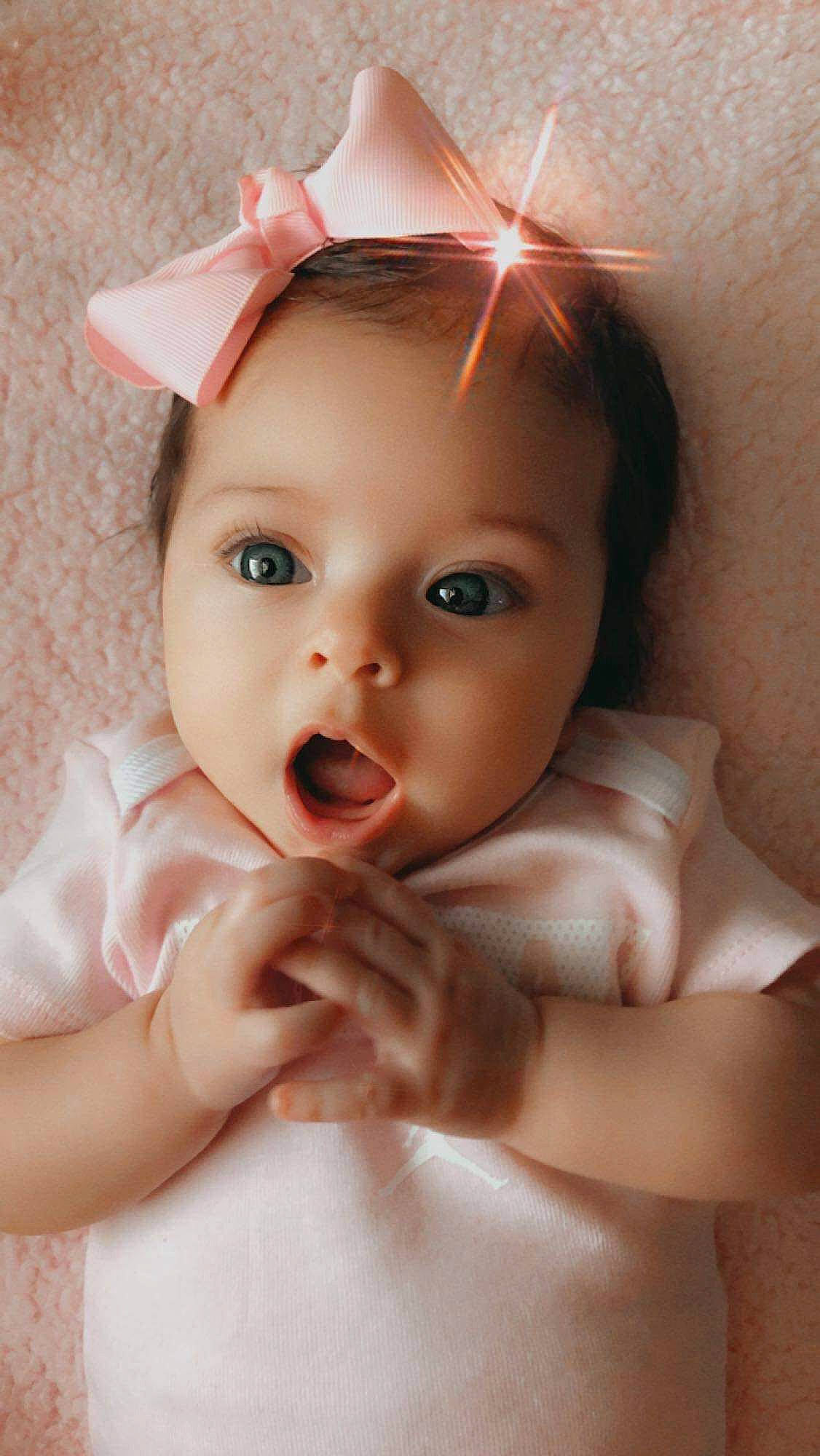 Aubrie joined the competition — help win amazing prizes! baby, beauty, cheek, child, chin, ear, eye, eyebrow, eyelash, face, finger, forehead, hand, head, lip, mouth, nose, person, pink, skin