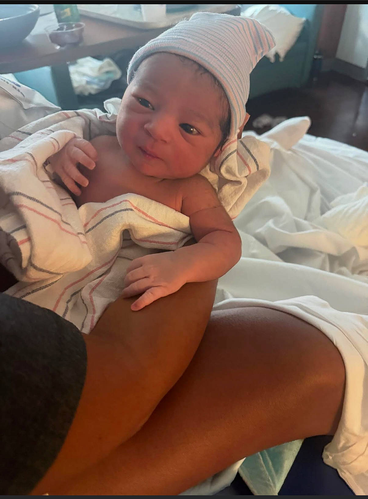 Giovanni joined the competition — help win amazing prizes! arm, baby, bed, blanket, comfort, cute, hat, holding, hospital, indoor, infant, newborn, newborn_baby, person, skin, sleepy, soft_light, striped, tender, wrapped