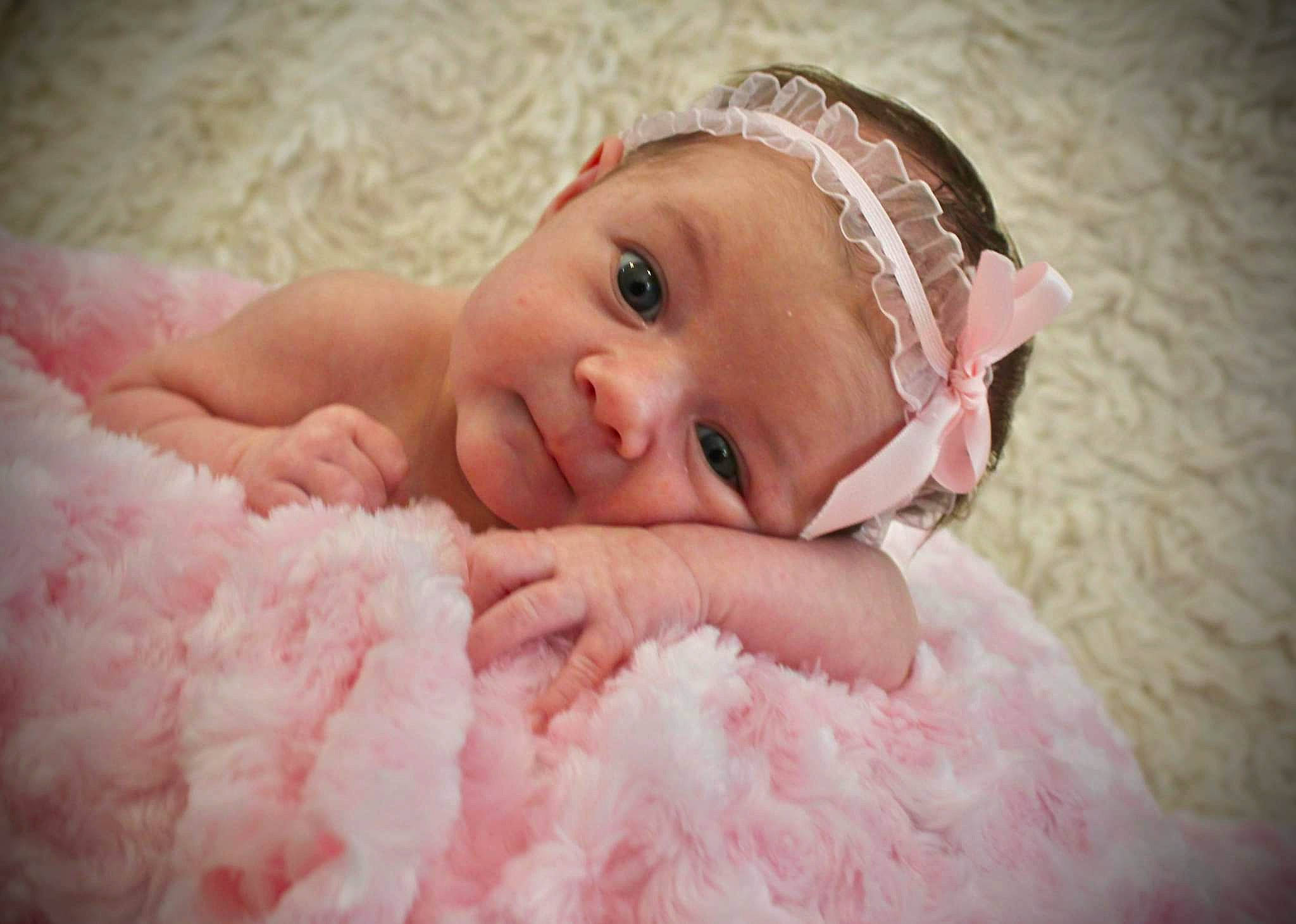 Mallorie Butler joined the competition — help win amazing prizes! baby, baby_toddler_clothing, child, close_up, comfort, dress, eyebrow, flash_photography, fun, fur, happy, headpiece, iris, linens, lip, nose, person, pink, skin, smile