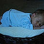 Grayson is registered to the contest to win money with this photo: baby, sleeping, basket, blanket, pajamas, blue_stripes, infant, cozy, indoor, rest, peaceful, face, head, hands, feet, carpet, soft, portrait, child, newborn