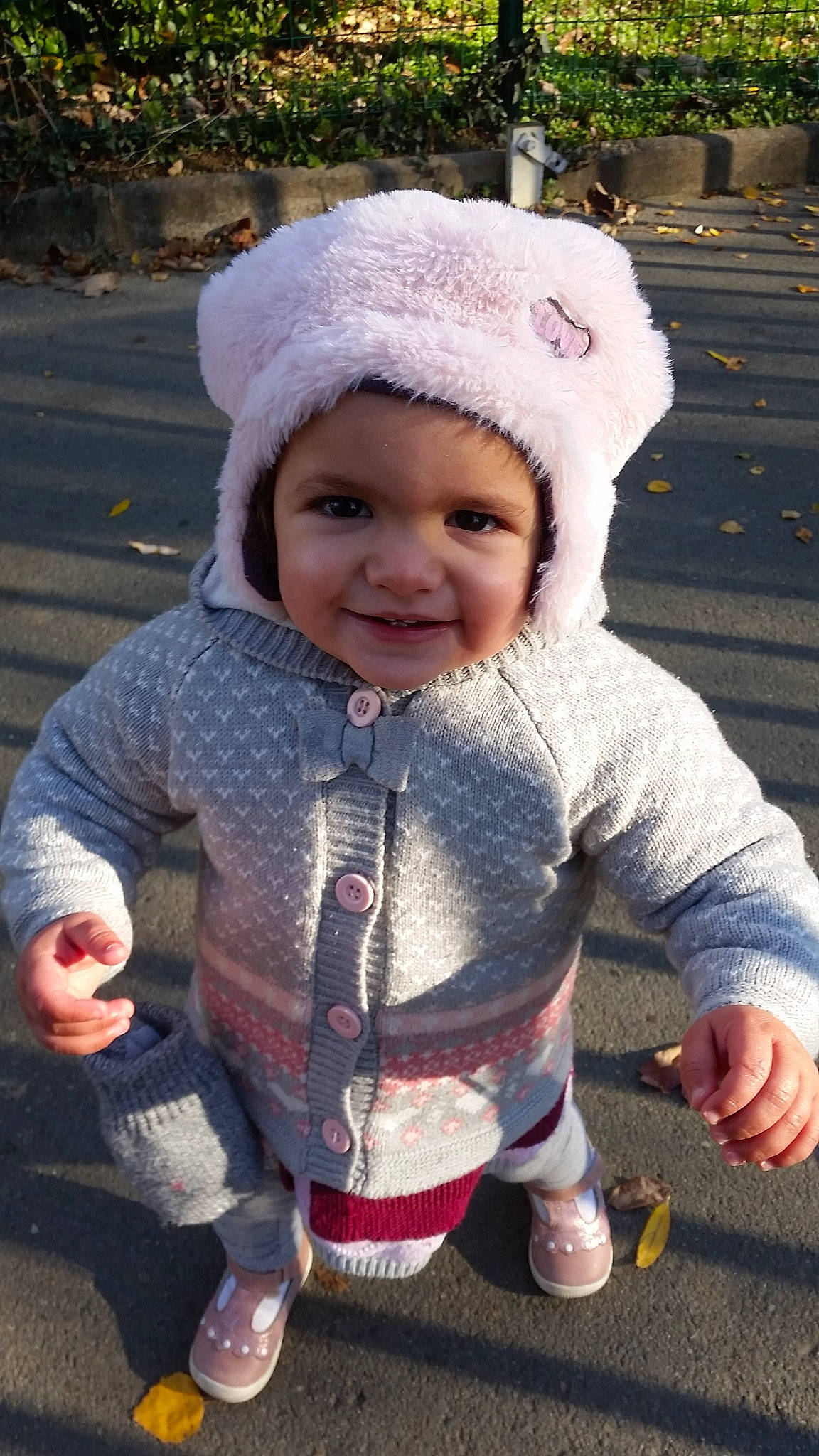 Nessia participe au concours pour gagner de l'argent avec cette photo : cap, child, crochet, fun, girl, headgear, headwear, infant, joy, knitting, material, person, pink, play, product, skin, smile, textile, toddler, winter