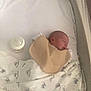 Luca is registered to the contest to win money with this photo: newborn, baby, sleeping, crib, blanket, bottle, bib, infant, bed, rest, cozy, peaceful, child, cute, soft, indoor, portrait, quiet, young, toddler