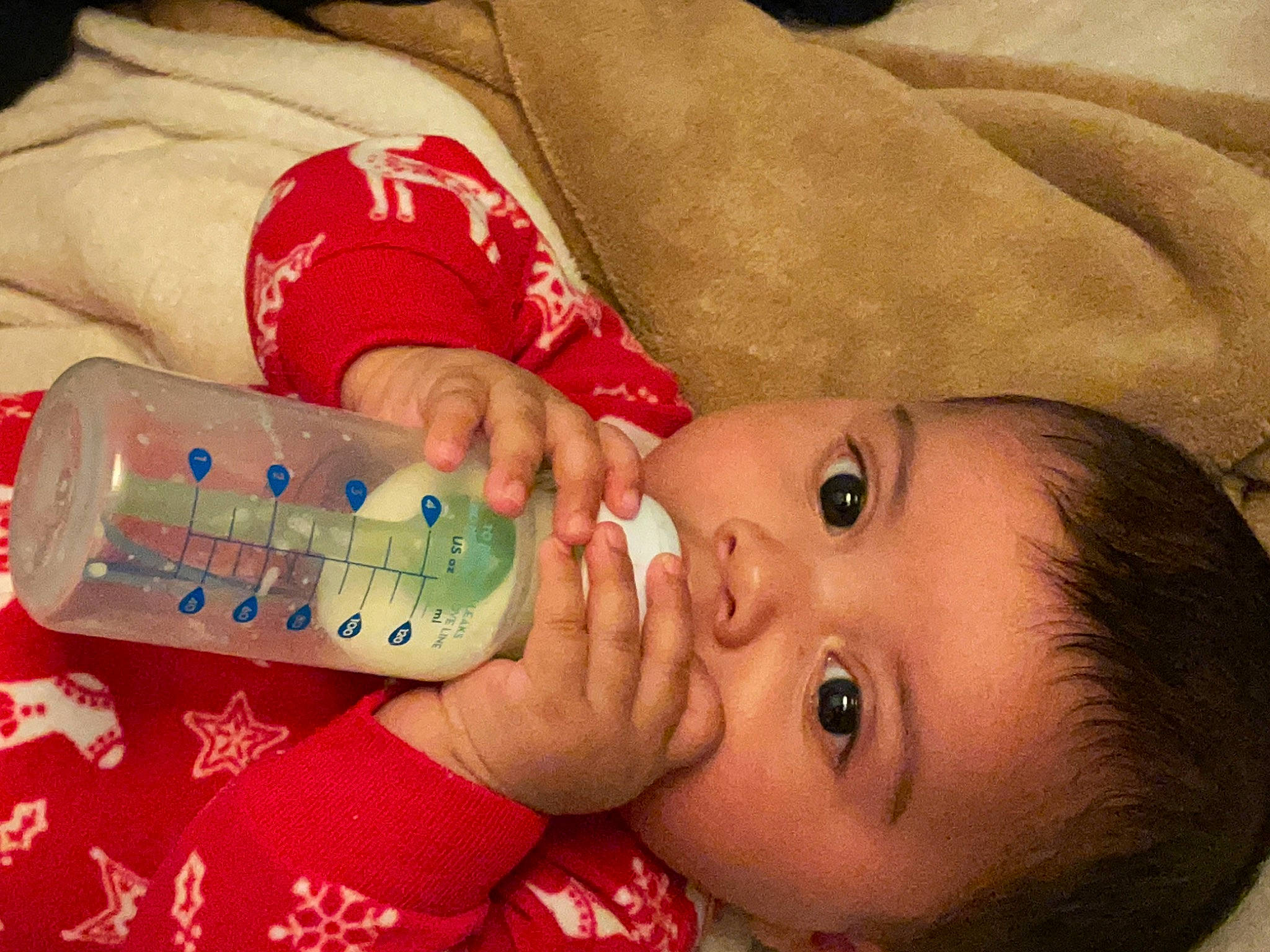 Logan joined the competition — help win amazing prizes! baby, baby_bottle, baby_products, bottle, cheek, child, comfort, drink, drinkware, eyelash, finger, happy, mouth, nail, nose, person, plastic, plastic_bottle, skin, toddler