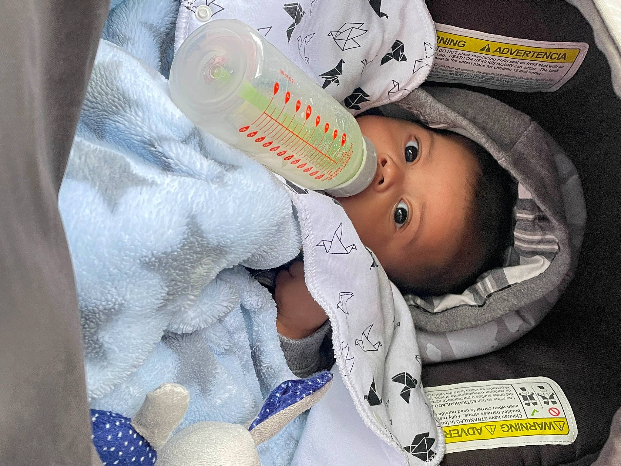 Logan is registered to the contest to win money with this photo: baby, baby_carriage, baby_in_car_seat, baby_products, baby_safety, baby_sleeping, baby_toddler_clothing, baseball_cap, cap, car_seat, carmine, child, comfort, drinkware, hat, linens, person, personal_protective_equipment, sleeve, toddler