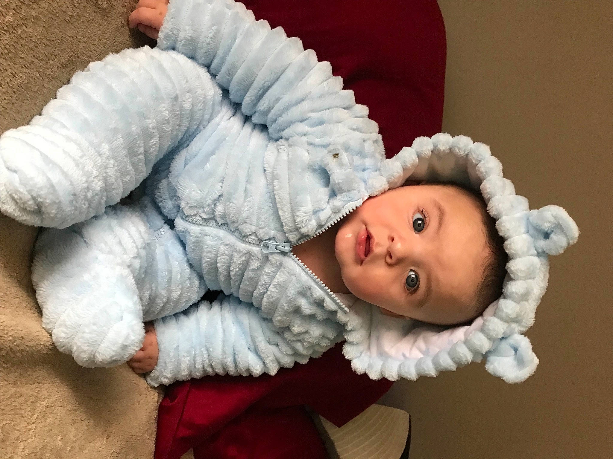 Reese is registered to the contest to win money with this photo: baby, baby_sleeping, baby_toddler_clothing, cheek, child, comfort, eye, fur, fur_clothing, happy, headgear, human_body, linens, lip, mouth, nose, person, skin, surprise, textile