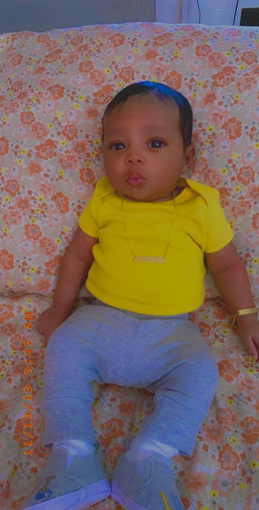 Joelle is registered to the contest to win money with this photo: baby, baby_toddler_clothing, cheek, child, person, smile, toddler, yellow