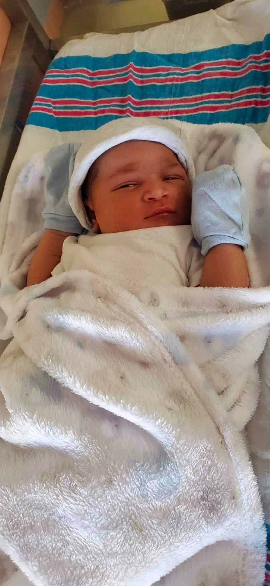 Andrew is registered to the contest to win money with this photo: baby, baby_products, baby_safety, baby_sleeping, baby_toddler_clothing, bedtime, child, comfort, face, headwear, linens, nap, person, room, skin, sleep, toddler