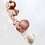 baby, sleeping, blanket, dolls, soft_toys, bed, cozy, child, indoor, cute, peaceful, rest, young_child, portrait, teddy_bear, plush, white_background, comfort, infant, sleep