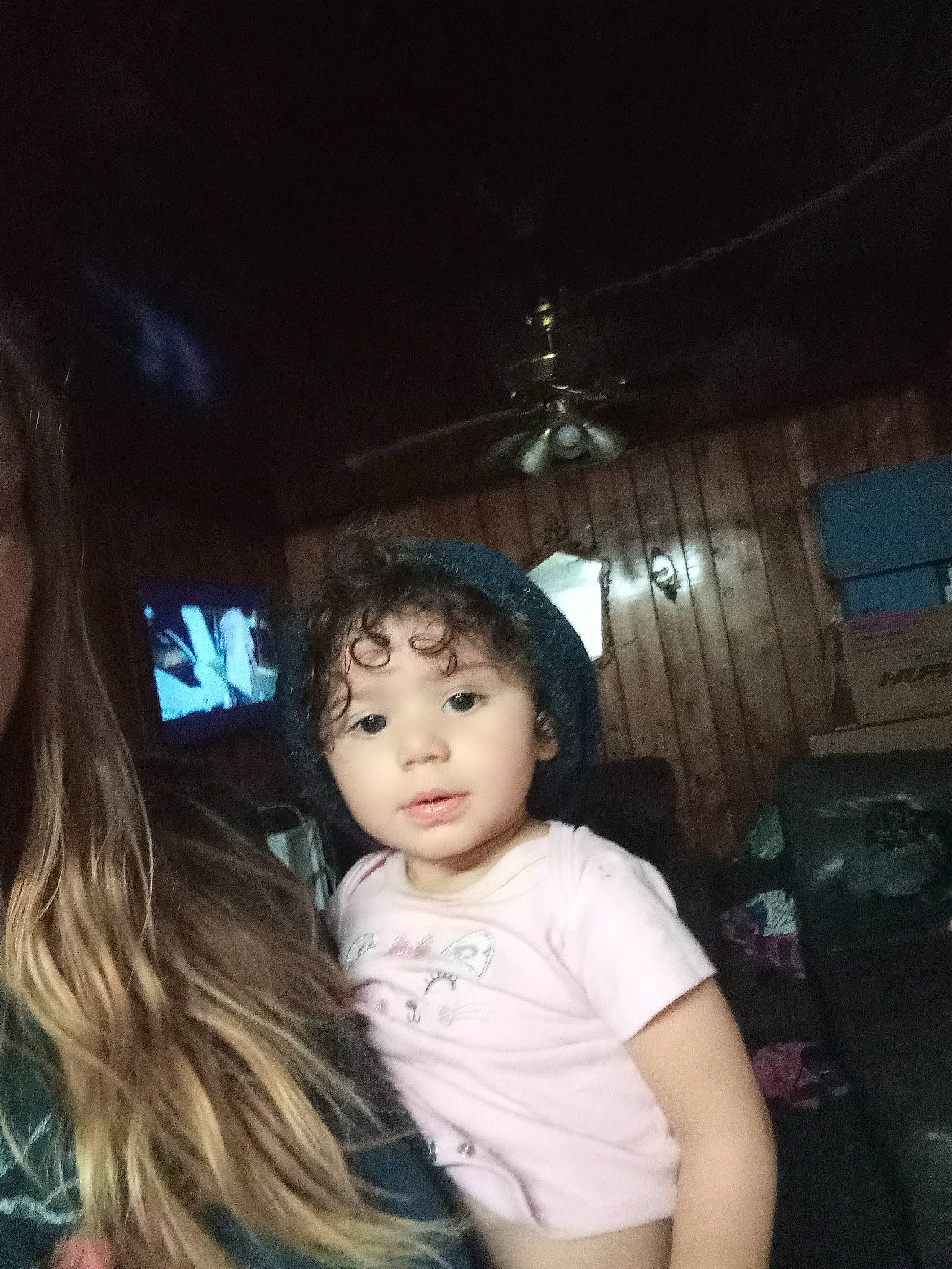 Jordyn is registered to the contest to win money with this photo: black_hair, brown_hair, chair, child, chin, darkness, ear, event, eyebrow, eyelash, flash_photography, fun, happy, long_hair, midnight, night, nose, person, sitting, t_shirt