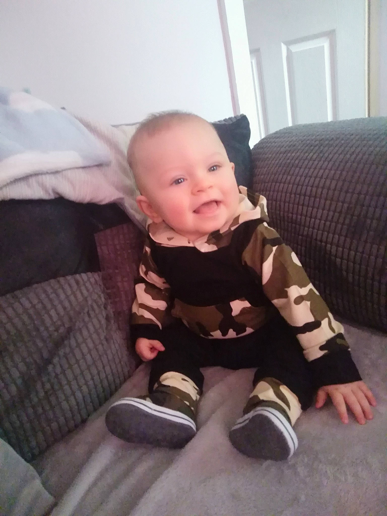 Kyden joined the competition — help win amazing prizes! baby, cheek, child, electronic_device, face, head, person, room, sitting, skin, smile, toddler