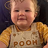 Timothy joined the competition — help win amazing prizes! toddler, child, baby, smiling, happy, portrait, high_chair, seated, indoor, home, yellow_shirt, striped_clothing, overalls, pooh, winnie_the_pooh, brown_hair, curly_hair, table, face, photography