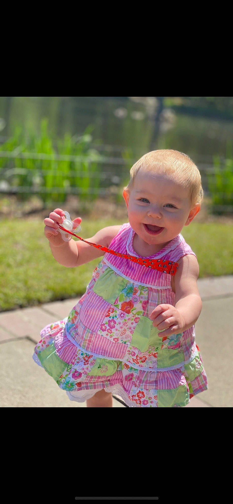 Grace joined the competition — help win amazing prizes! baby, baby_toddler_clothing, dress, eye, finger, gesture, grass, happy, head, leaf, leisure, magenta, people_in_nature, person, pink, plant, skin, sleeve, smile, summer