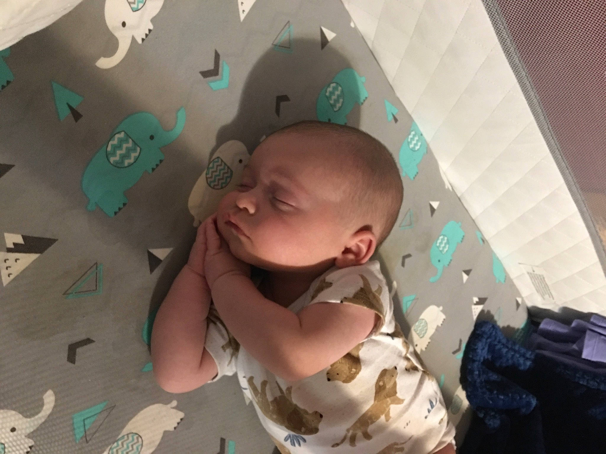 Cyrus is registered to the contest to win money with this photo: baby, baby_products, bag, ceiling, child, comfort, design, flooring, fun, happy, linens, luggage_and_bags, pattern, person, pink, play, room, sitting, space, textile