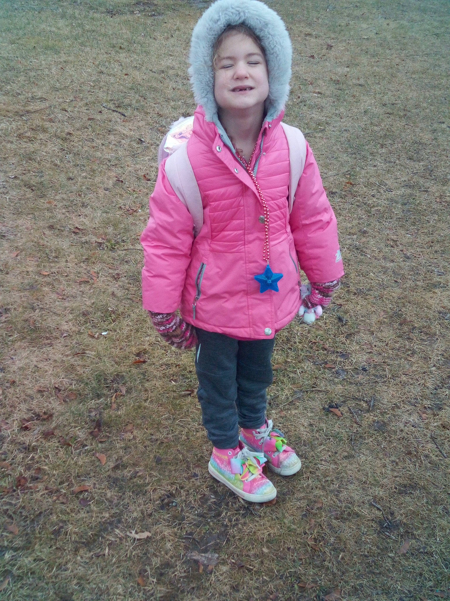 Aleah is registered to the contest to win money with this photo: asphalt, child, freezing, fun, grass, happy, hood, joy, landscape, leisure, magenta, pattern, people_in_nature, person, pink, plant, recreation, sleeve, soil, toddler