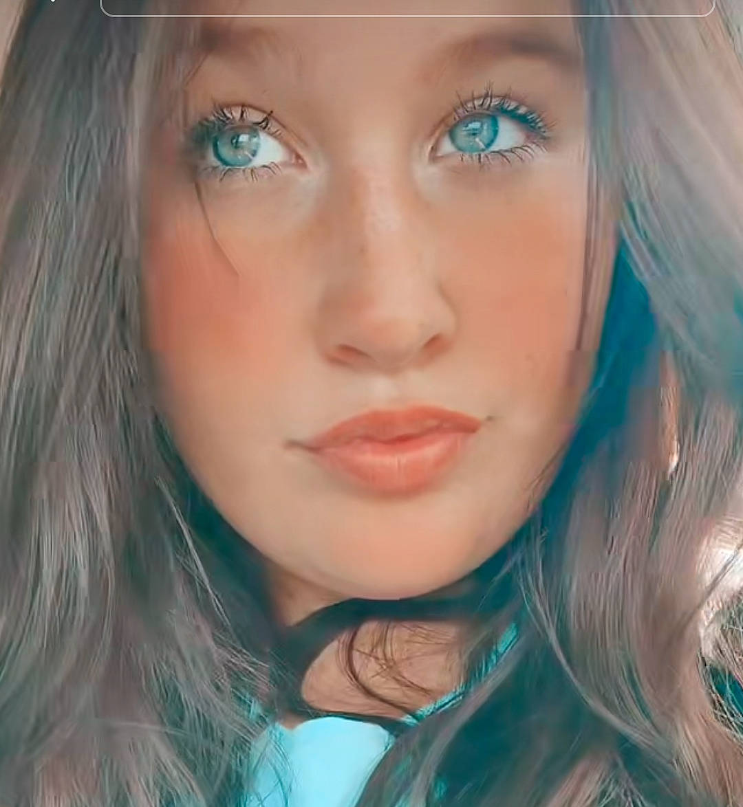 Annmarie is registered to the contest to win money with this photo: aqua, azure, blue, cheek, chin, cool, eye_liner, eyebrow, eyelash, forehead, green, hair, iris, jaw, layered_hair, lip, makeover, mouth, nose, person