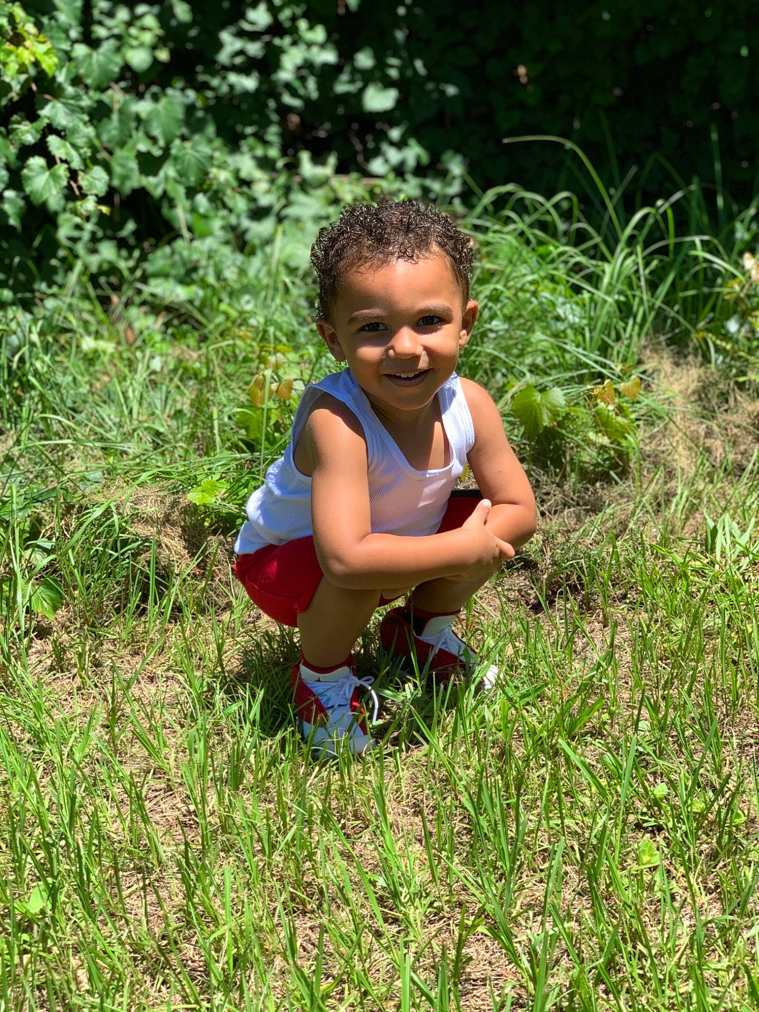 Jermon joined the competition — help win amazing prizes! adaptation, baby_toddler_clothing, ecoregion, grass, grass_family, grassland, groundcover, happy, joy, mammal, meadow, natural_landscape, people_in_nature, person, plant, plant_community, shorts, shrub, smile, sunlight