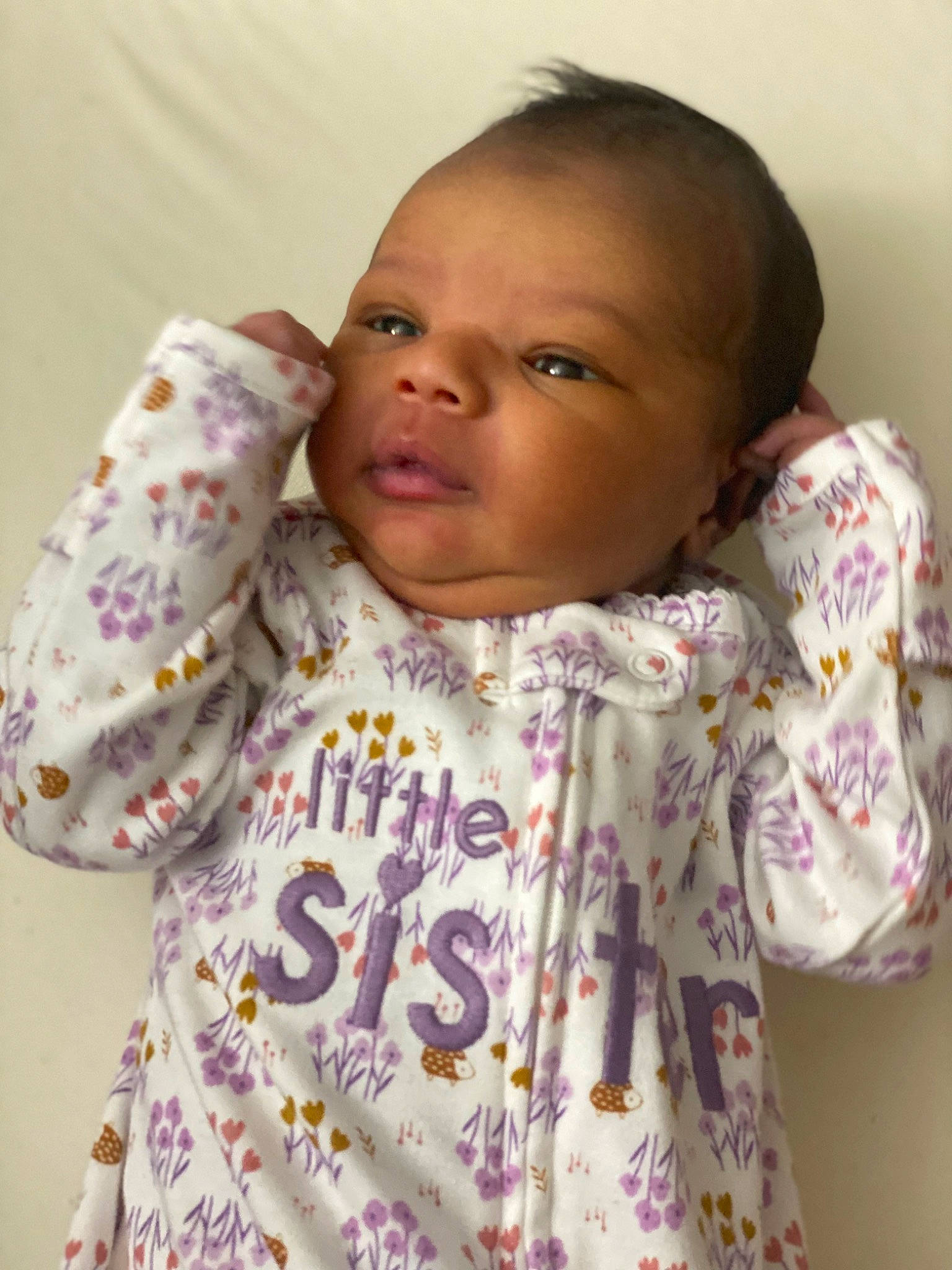 Jaleigha is registered to the contest to win money with this photo: arm, baby_toddler_clothing, cheek, ear, eyelash, facial_expression, finger, forehead, gesture, happy, lip, mouth, neck, nose, outerwear, person, pink, skin, sleeve, textile