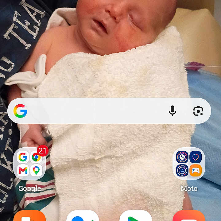 Nevaeh Davis joined the competition — help win amazing prizes! baby, sleeping, towel, person, arm, phone_screen, app_icons, advertisement, word_jumble, indoor, closeup, human, child, blanket, comfortable, resting, mobile, technology, screen, casual