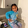 Kehlani joined the competition — help win amazing prizes! child, clothing, computer, computerhardware, electronics, face, female, girl, hardware, head, mobilephone, monitor, pants, person, phone, photography, portrait, screen, sitting, sleeve