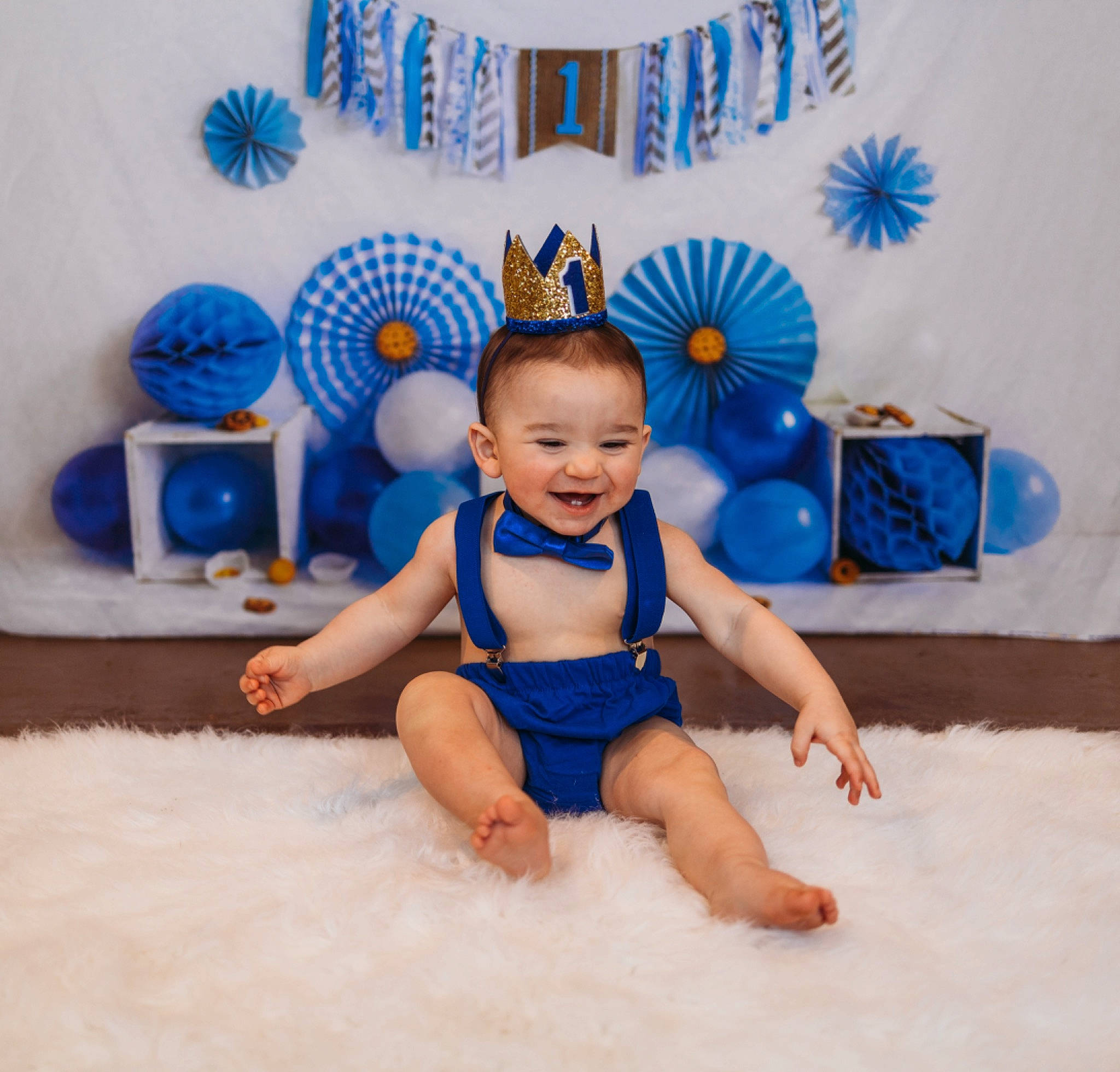 Jameson is registered to the contest to win money with this photo: aqua, azure, baby, baby_products, baby_toddler_clothing, barefoot, blue, child, electric_blue, foot, fun, happy, joy, party_supply, person, product, smile, stuffed_toy, thigh, thumb