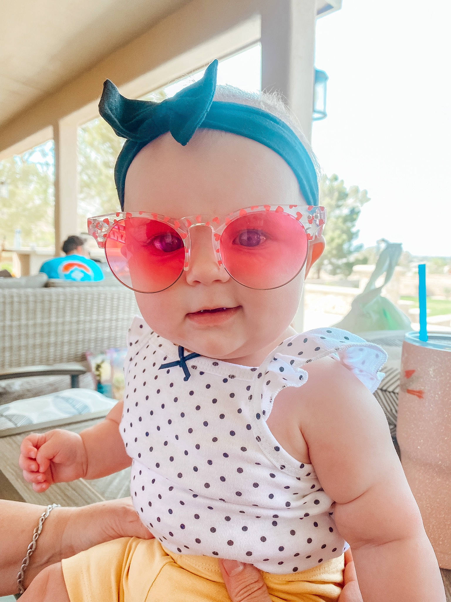 Demi is registered to the contest to win money with this photo: baby_toddler_clothing, cap, doll, electric_blue, eyewear, fun, glasses, goggles, happy, hat, leisure, lip, magenta, person, pink, sleeve, street_fashion, sunglasses, toddler, toy