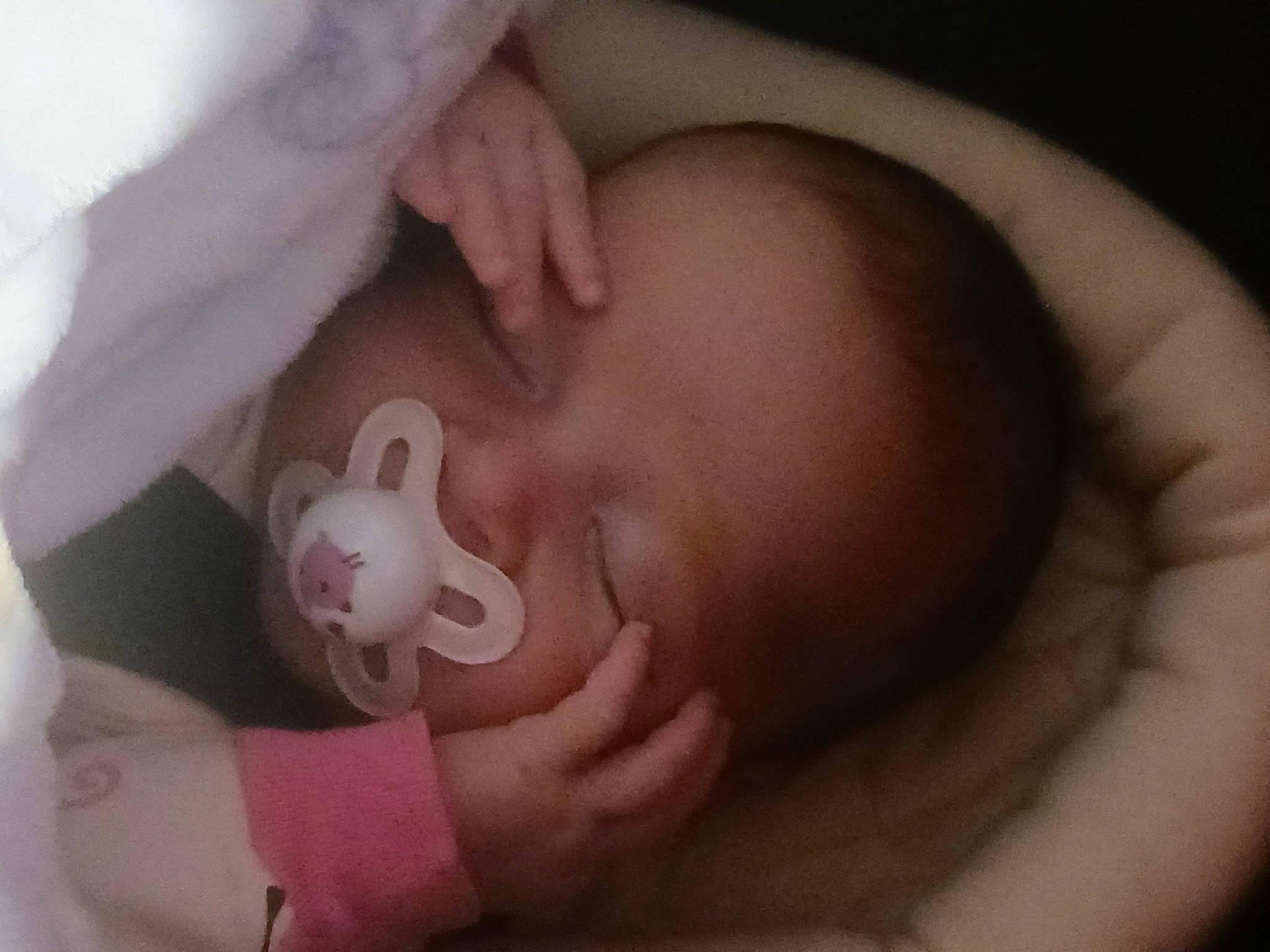 Zeletta is registered to the contest to win money with this photo: baby, cheek, comfort, ear, eye, eyebrow, eyelash, finger, gesture, hand, human_body, iris, lip, mammal, mouth, neck, nose, person, pink, skin